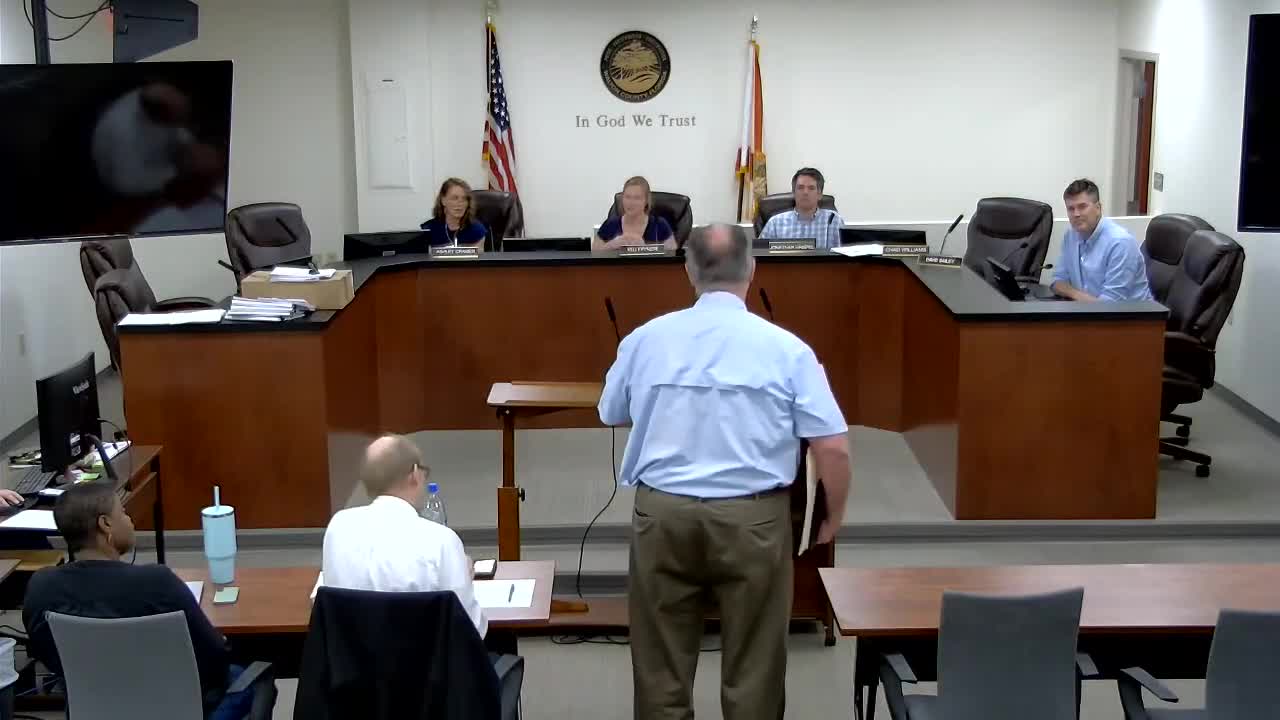 DRB gives design guidance to Garages at Miramar vehicle‑storage proposal; parapet relief suggested with added detail