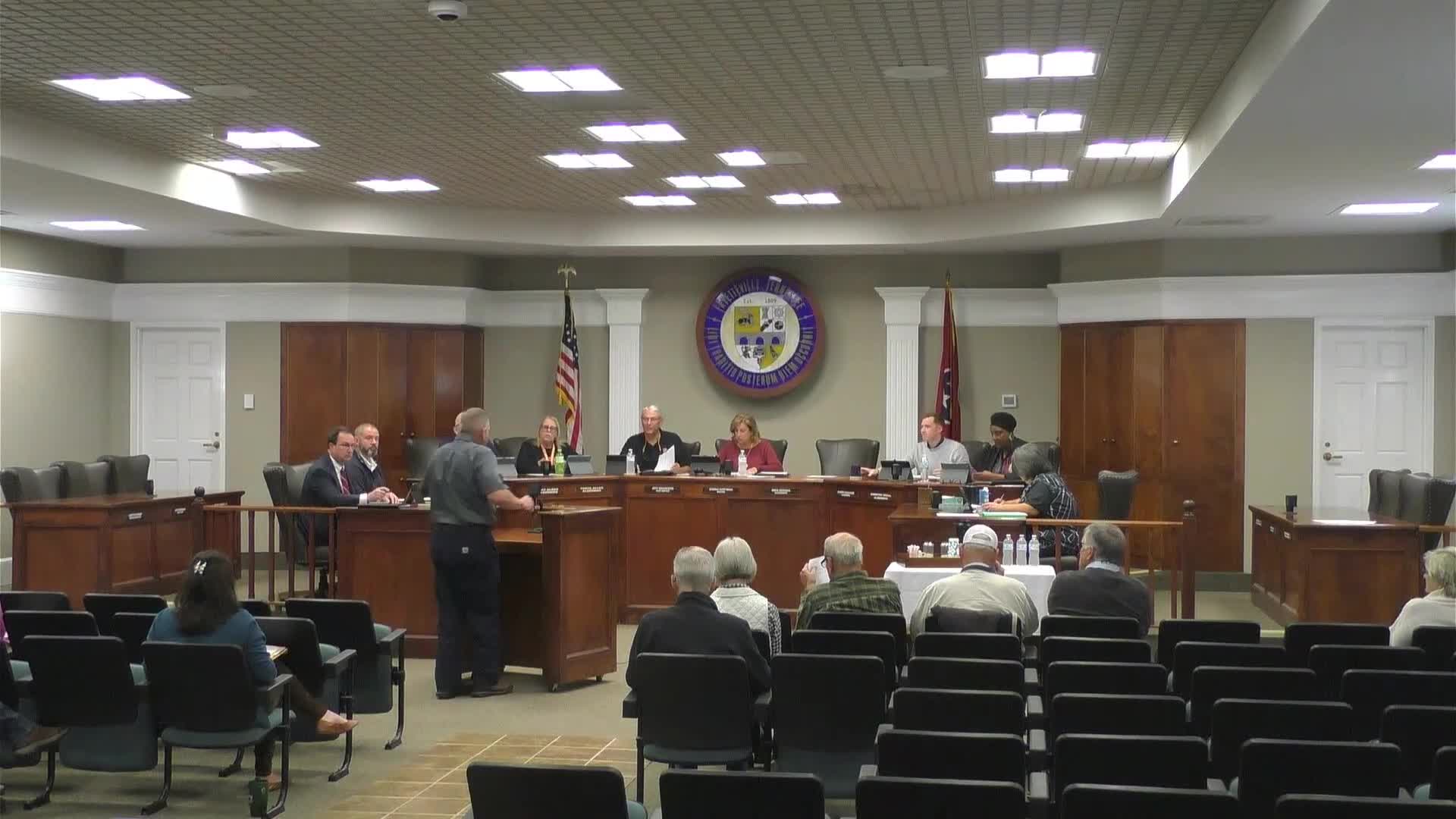 Public works reports waterline progress and recommends replacing a failing pickup; sale and salvage options discussed