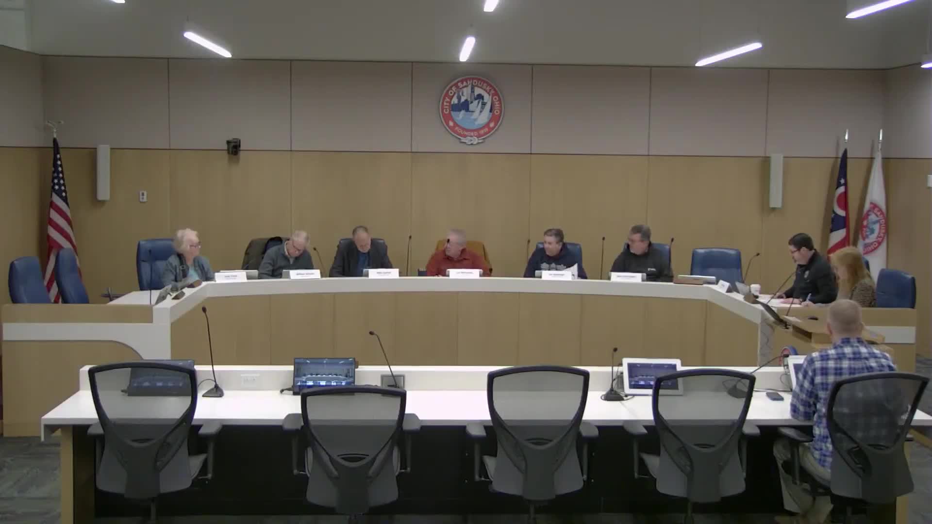 Votes at a glance: committee excuses two members, approves minutes and adjourns