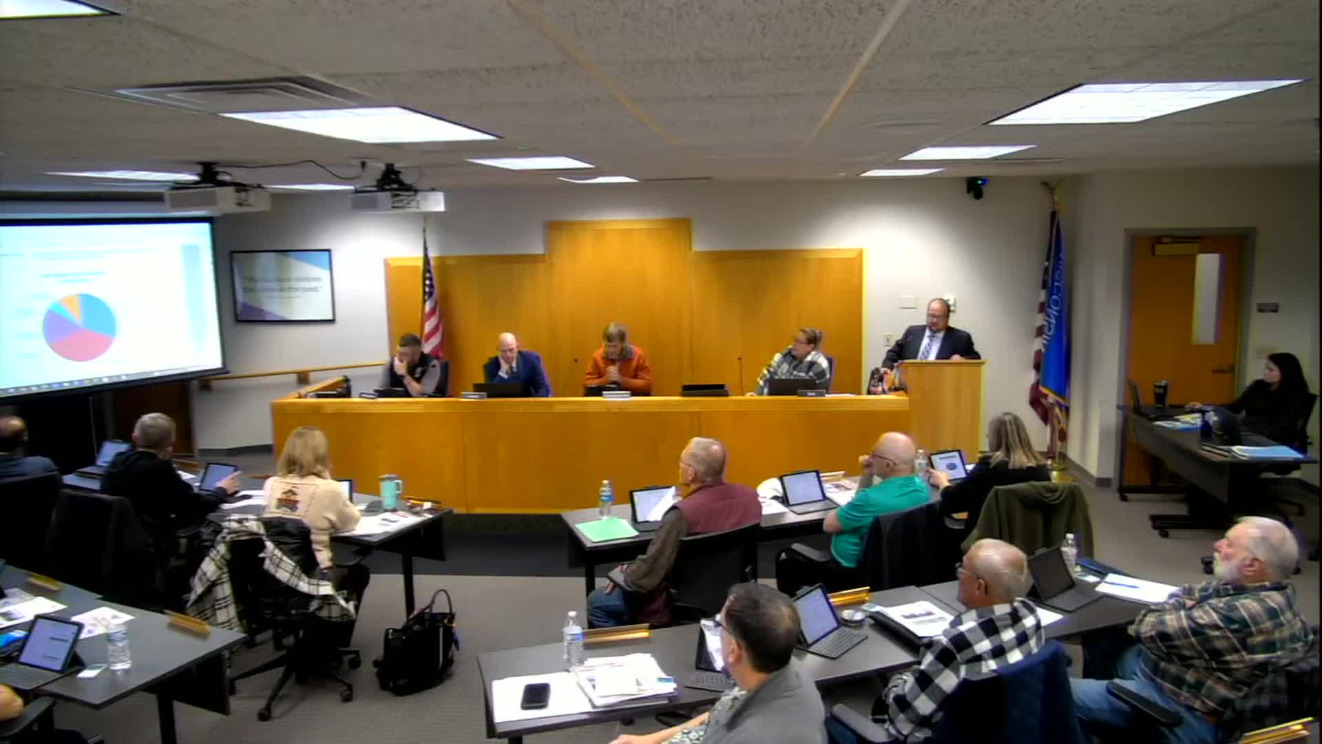 Highway commissioner says county below recommended paving cycle; reports four bridge replacements and staffing gains