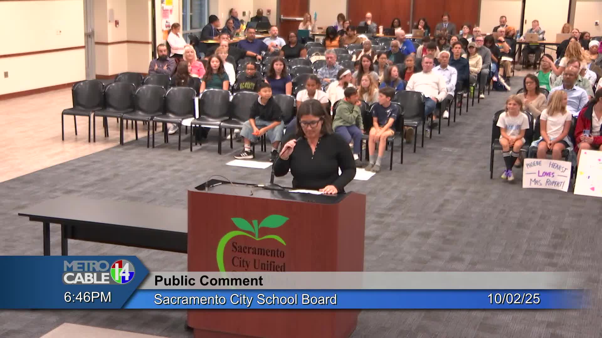 Phoebe Hearst parents and students demand reinstatement of teacher after transfer over classroom carpet incident