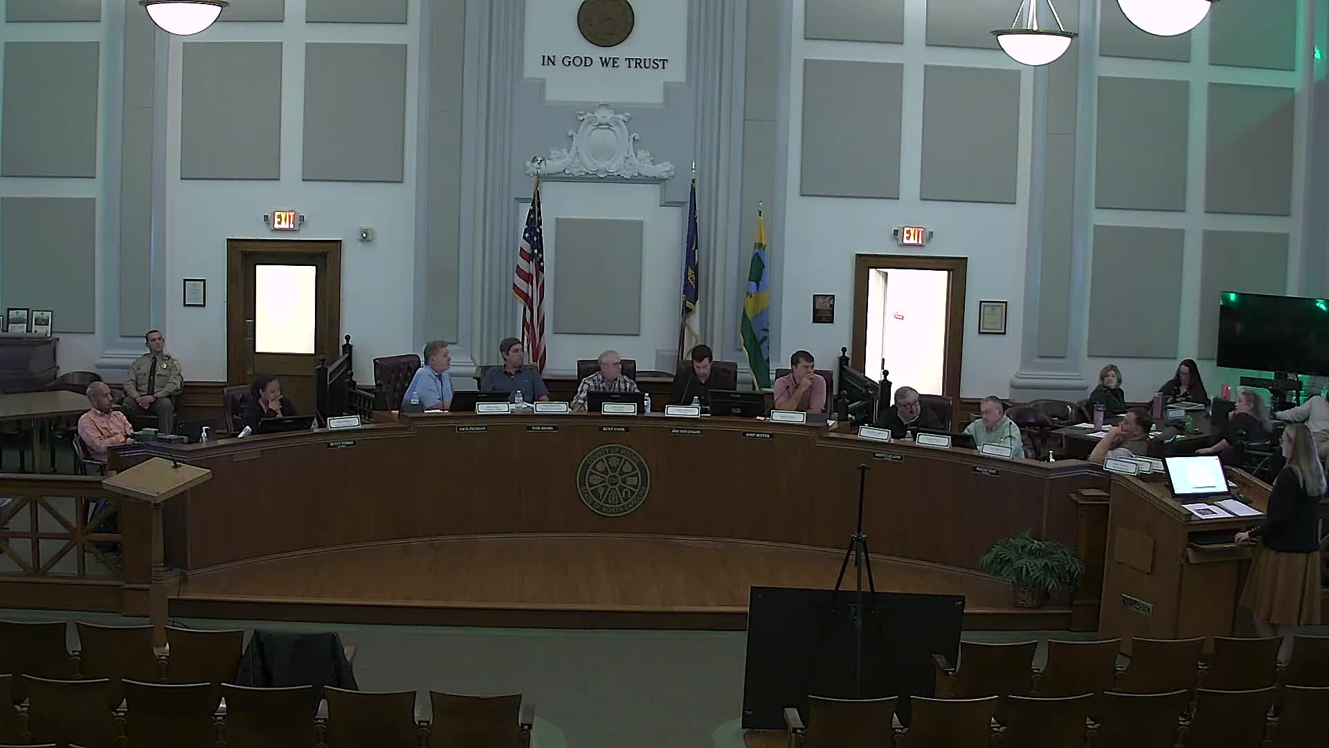 Board discusses small‑town model overlay; members raise infrastructure and scale questions