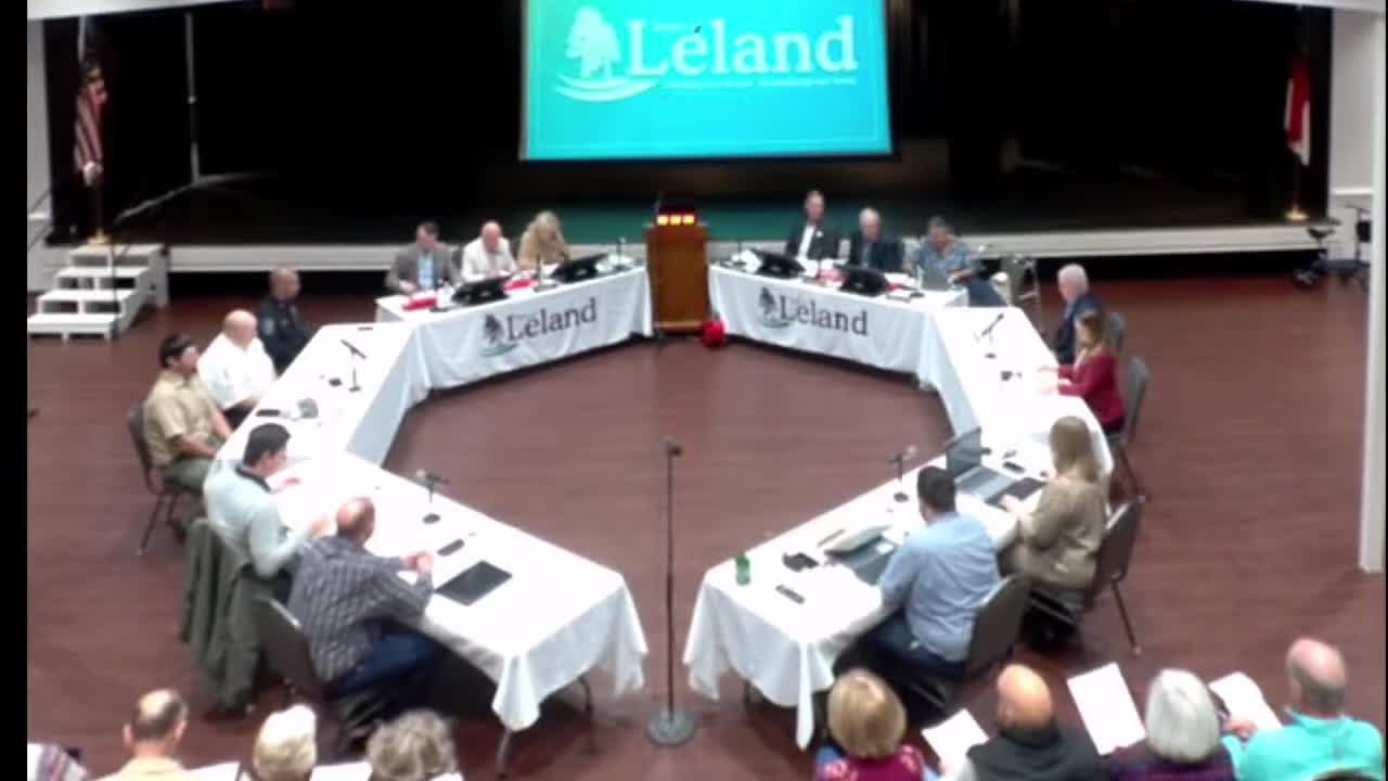 Leland leaders review open‑burning ban after large land‑clearing blazes; residents urge stronger enforcement