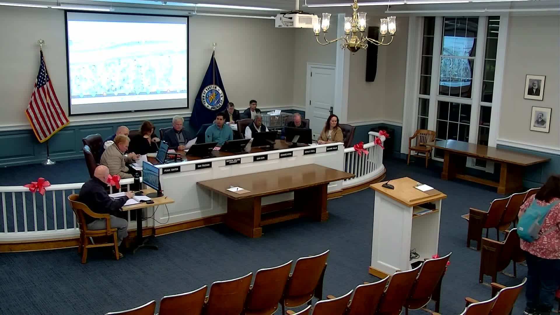 Owner seeks lifting of owner-occupancy covenant on two Teddy Place duplexes; planning board reserves decision