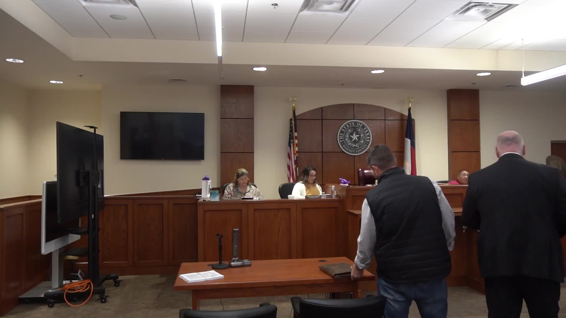 Commissioners debate county role in food‑pantry pickups; motion to authorize county resources dies