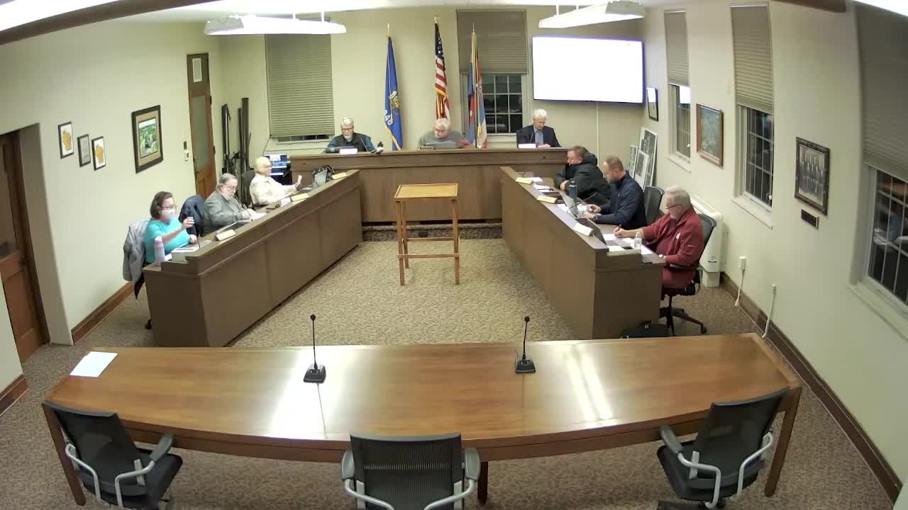 Resident questions why their public comment wasn’t included in meeting minutes; clerk explains minutes record actions not verbatim speech