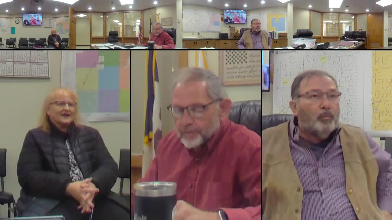 Resident warns board three near-misses at 4‑way stop; asks county to consider flashing light or reflective sign