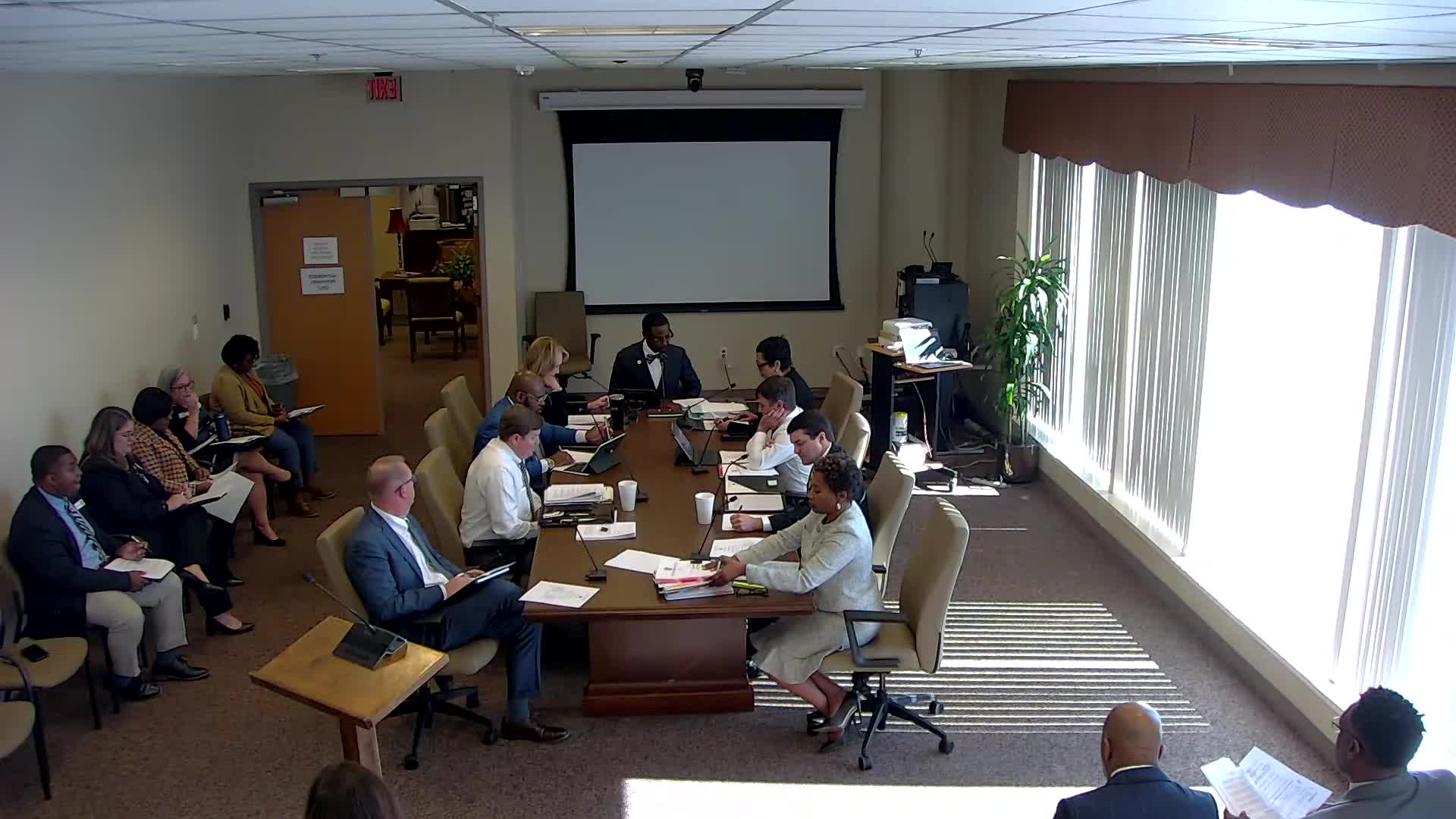 Mobile council delays vote on vacant‑property ordinance after debate over owner self‑reporting