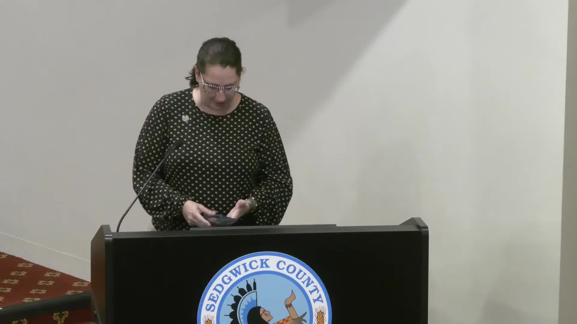 Family advocates urge firing of staff tied to juvenile detention death; commission cites pending litigation