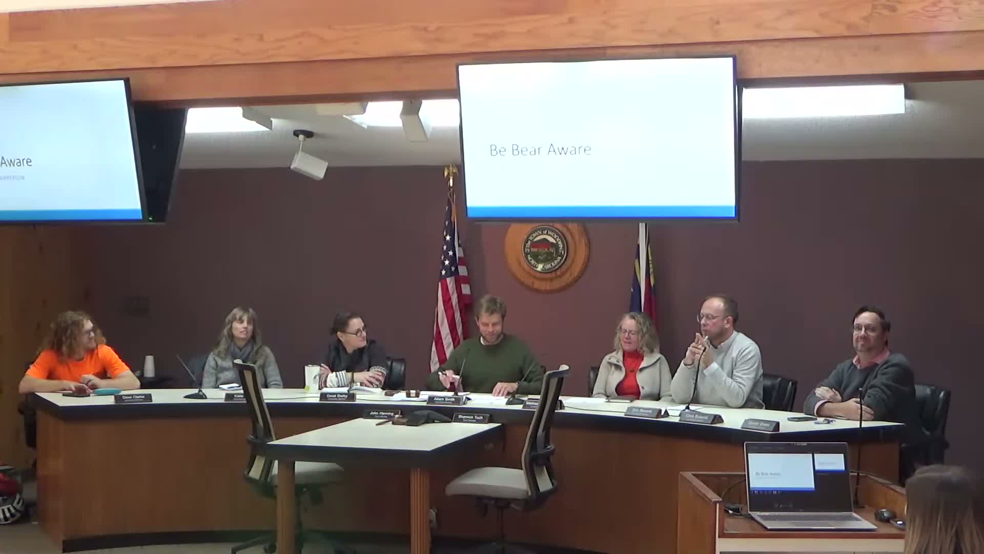 Woodfin members discuss 'Be Bear Aware' plan and options for bear‑proof trash