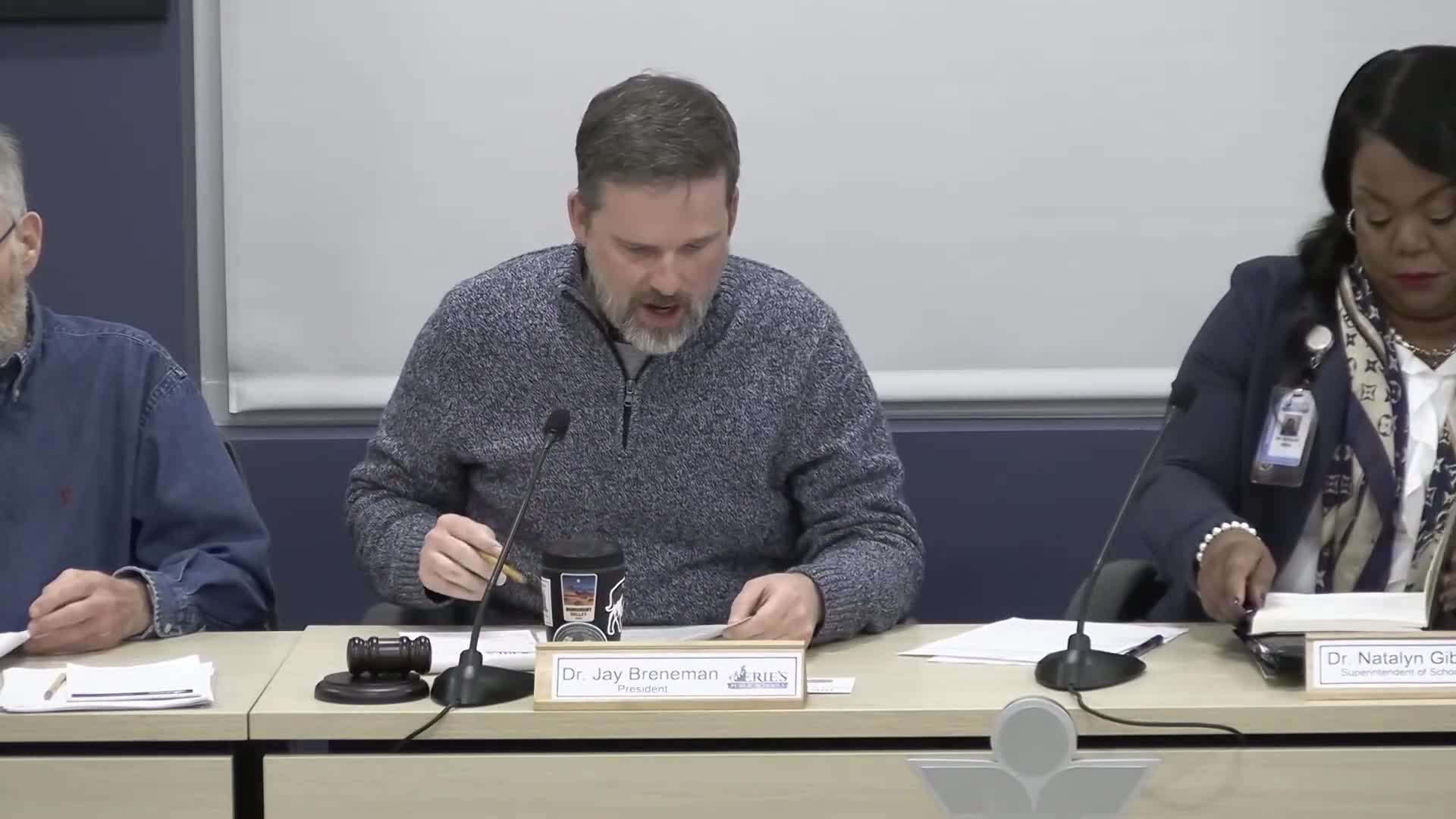 Board approves consent items, bonds resolution and service agreement; two abstentions recorded