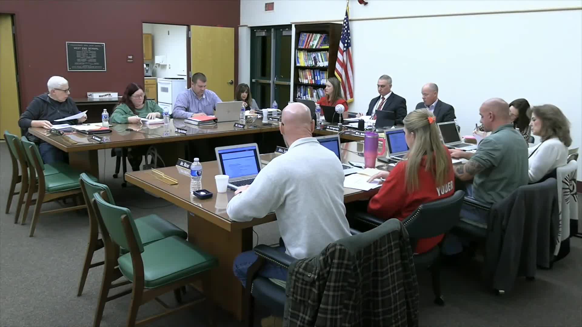 District presents state assessment data showing low elementary ELA proficiency; board presses for clearer growth metrics