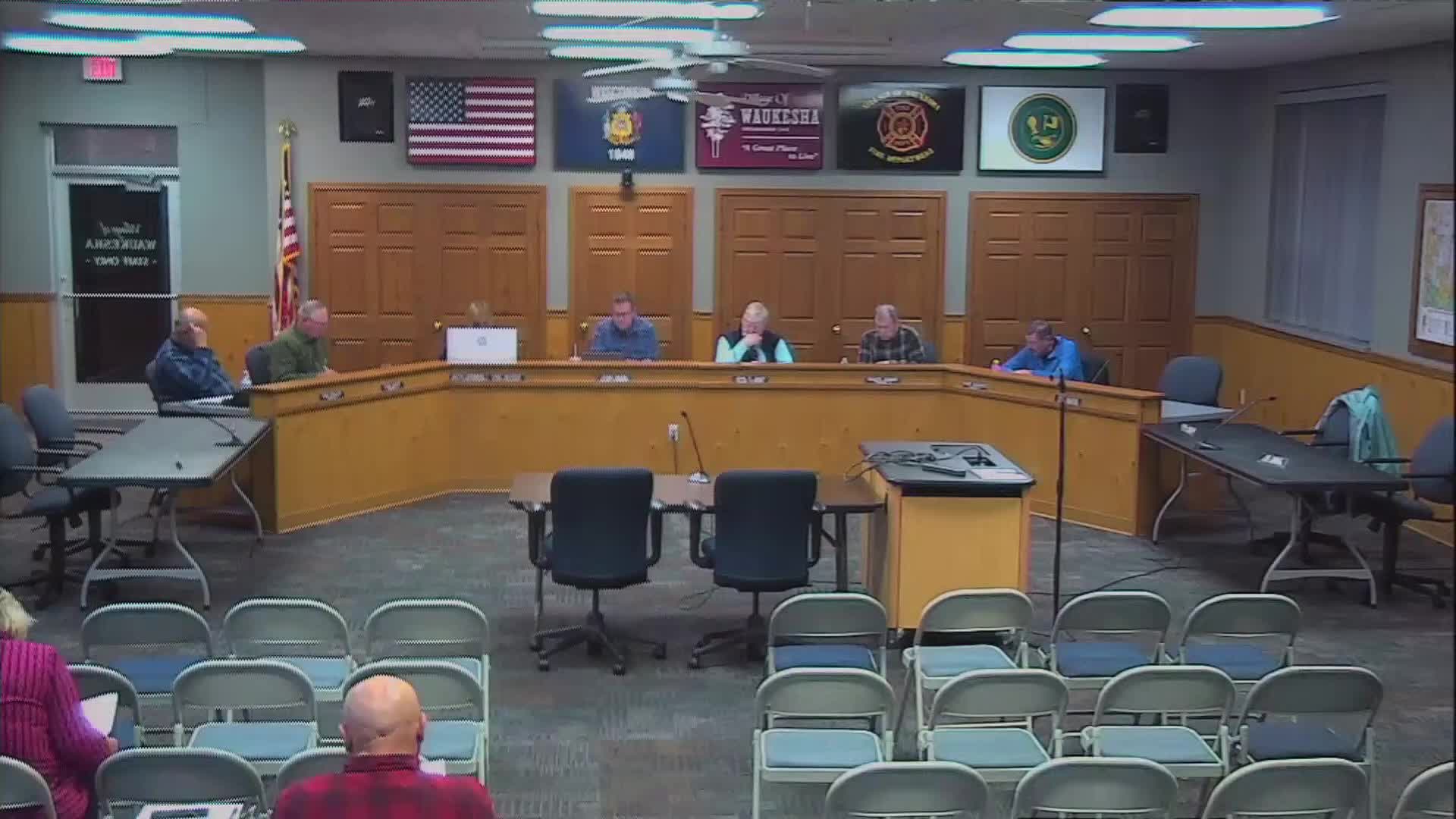 Unidentified speaker reads two budget figures: $567,993 and $89,264 for conservation and development