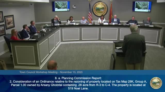 Council approves rezoning of 1205 Rock Springs Road to C‑4; one abstention recorded