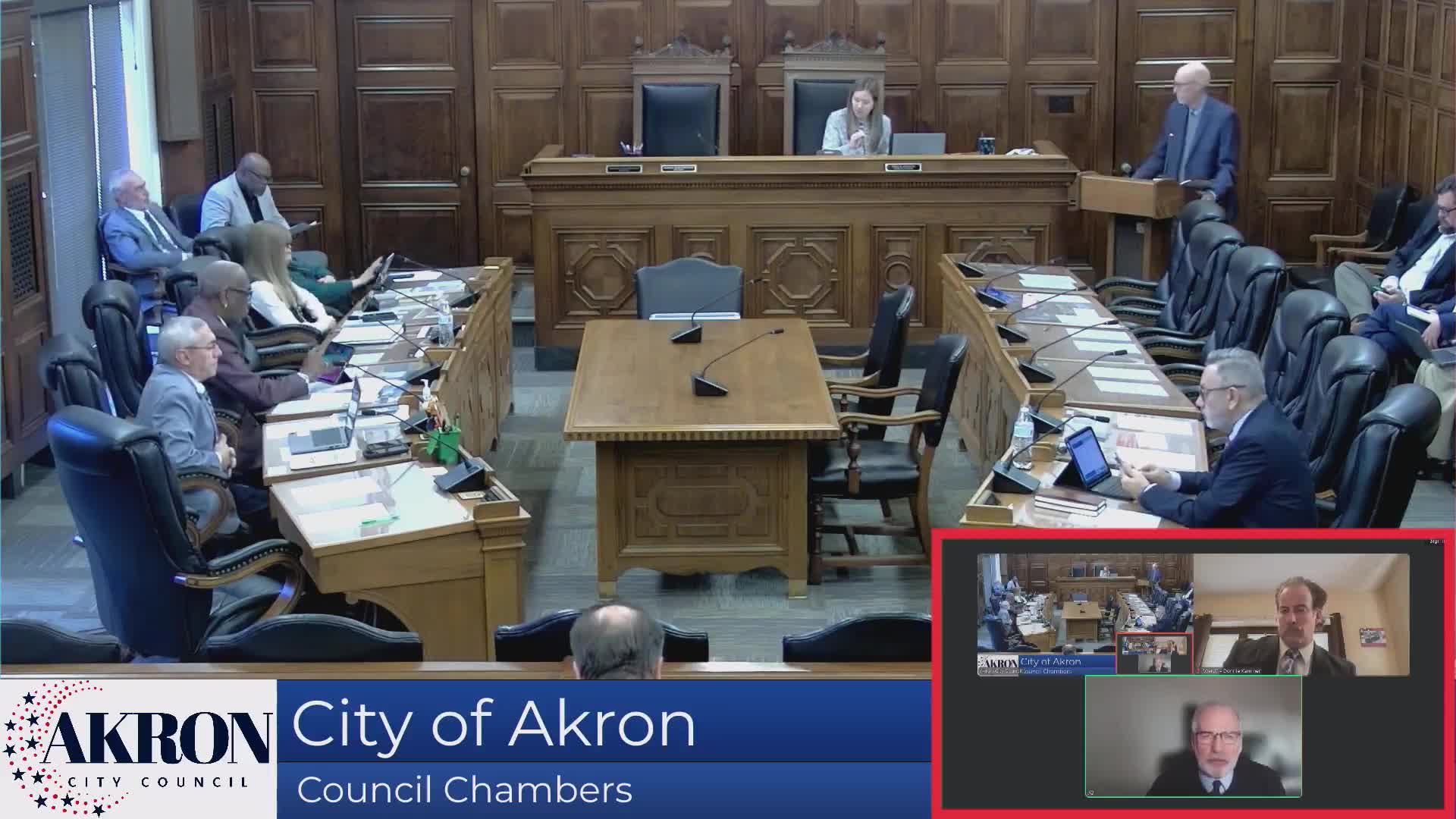 Committee reviews several smaller conditional‑use requests, including two oversized garages and a downtown projecting sign