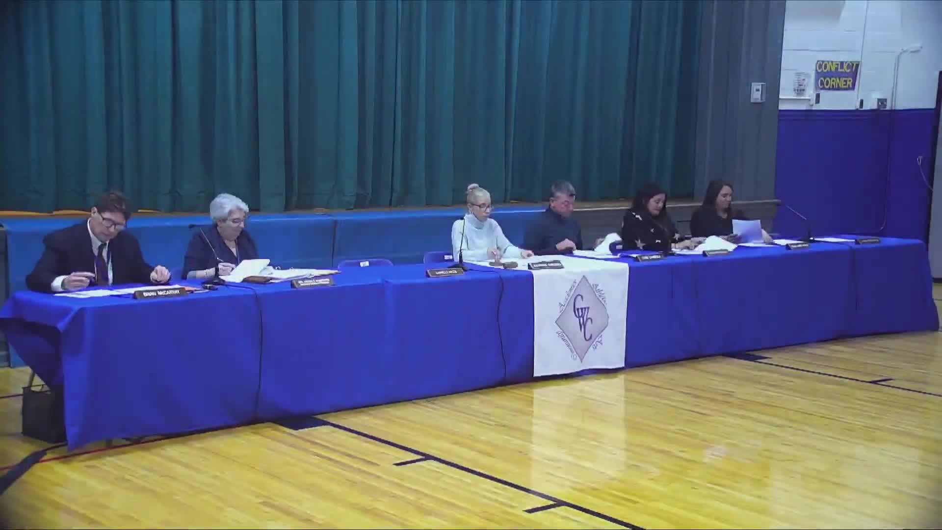 Board approves consent agenda, personnel and finance items unanimously; moves to executive session