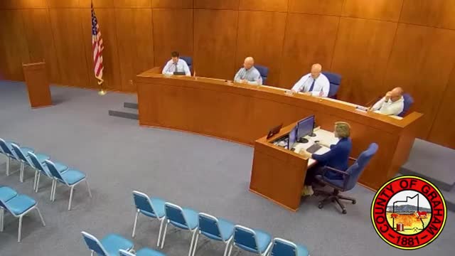 Board OKs detention‑center food contract after changing 'shall' to 'may' to preserve catering options