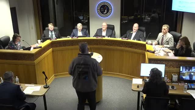 Resident tells commissioners county inspection missed engineered roof work; staff to follow up