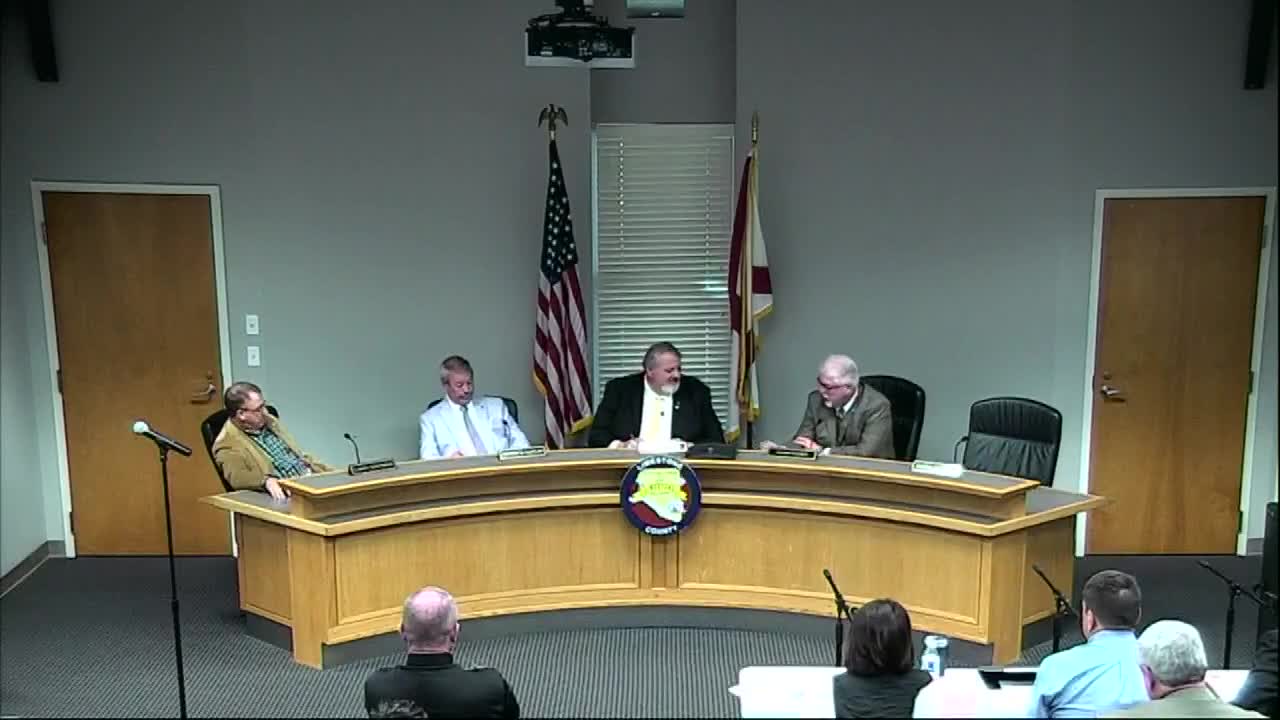 Commission discusses setting aside year‑end surplus for grant‑matching fund and district roads