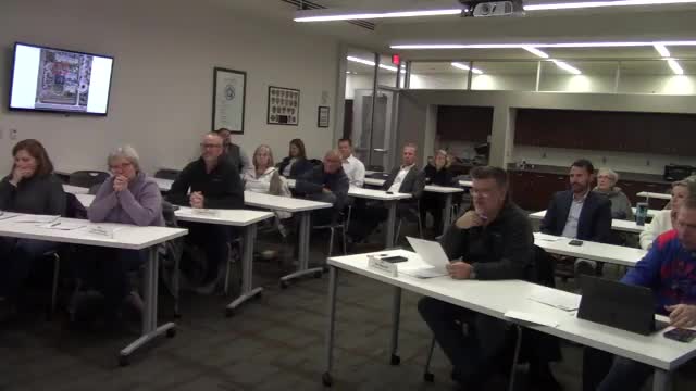 Planning commission approves 20-to-13-foot rear-yard variance for four-unit townhome at Woodbridge Court