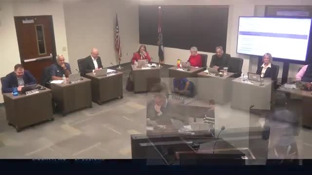 School board hears finance report; refinancing saves "just over $13,200,000," district finance director says