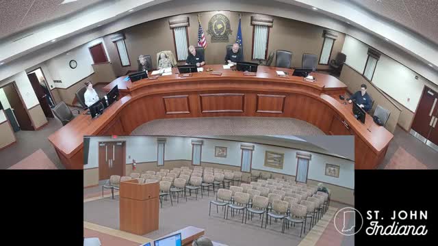 St. John board OKs $127,924 parking‑lot resurfacing; members press for local vendors, budget clarity