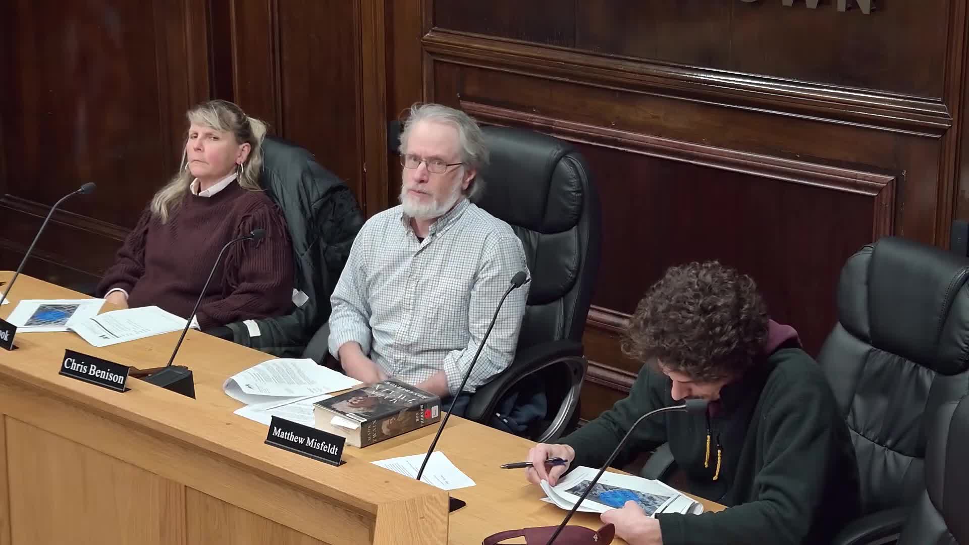 BZA tables conditional‑use request for proposed multifamily at 216 7th St. pending site‑plan review