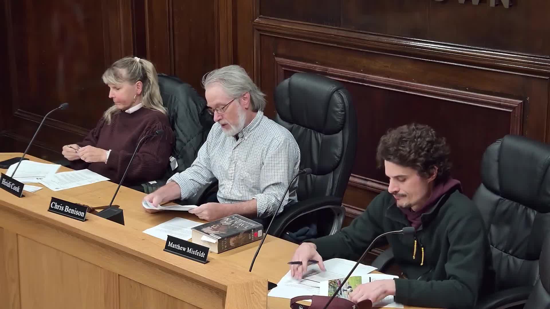 Morgantown BZA grants parking variance for 734 Wells St., requires parking‑permit condition