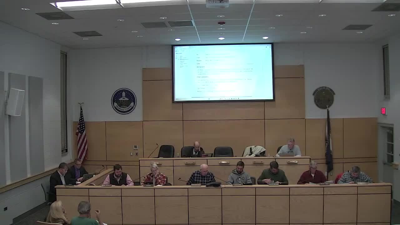 Owner John Wright presents rezoning workshop for split‑zoned parcel on Trinity Lane