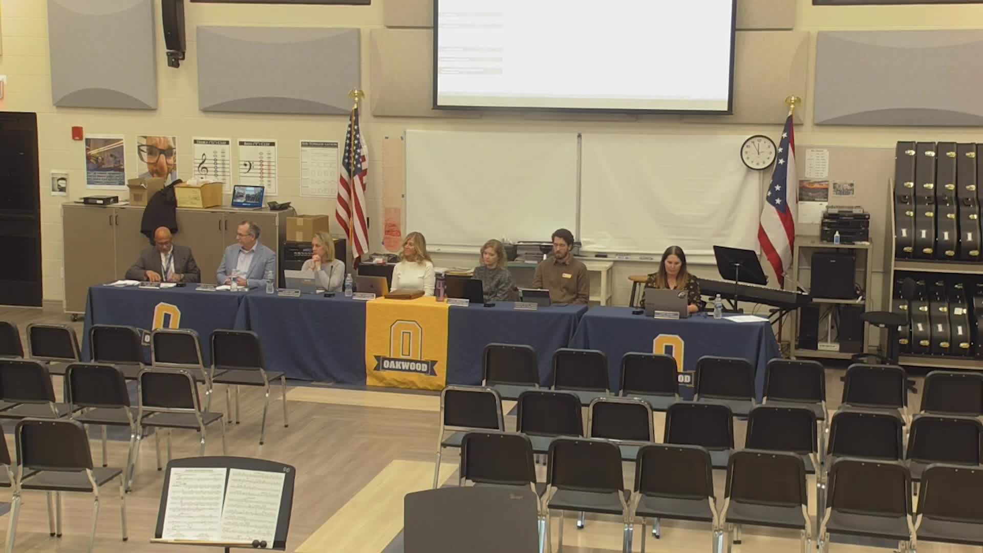 Oakwood Board approves 7‑year lease for district office; OKs OFCC participation, contracts and personnel actions