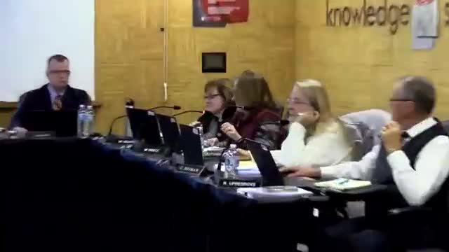 Board debates AP versus dual-enrollment weight in program-of-studies; approves 2026–27 program with concerns noted