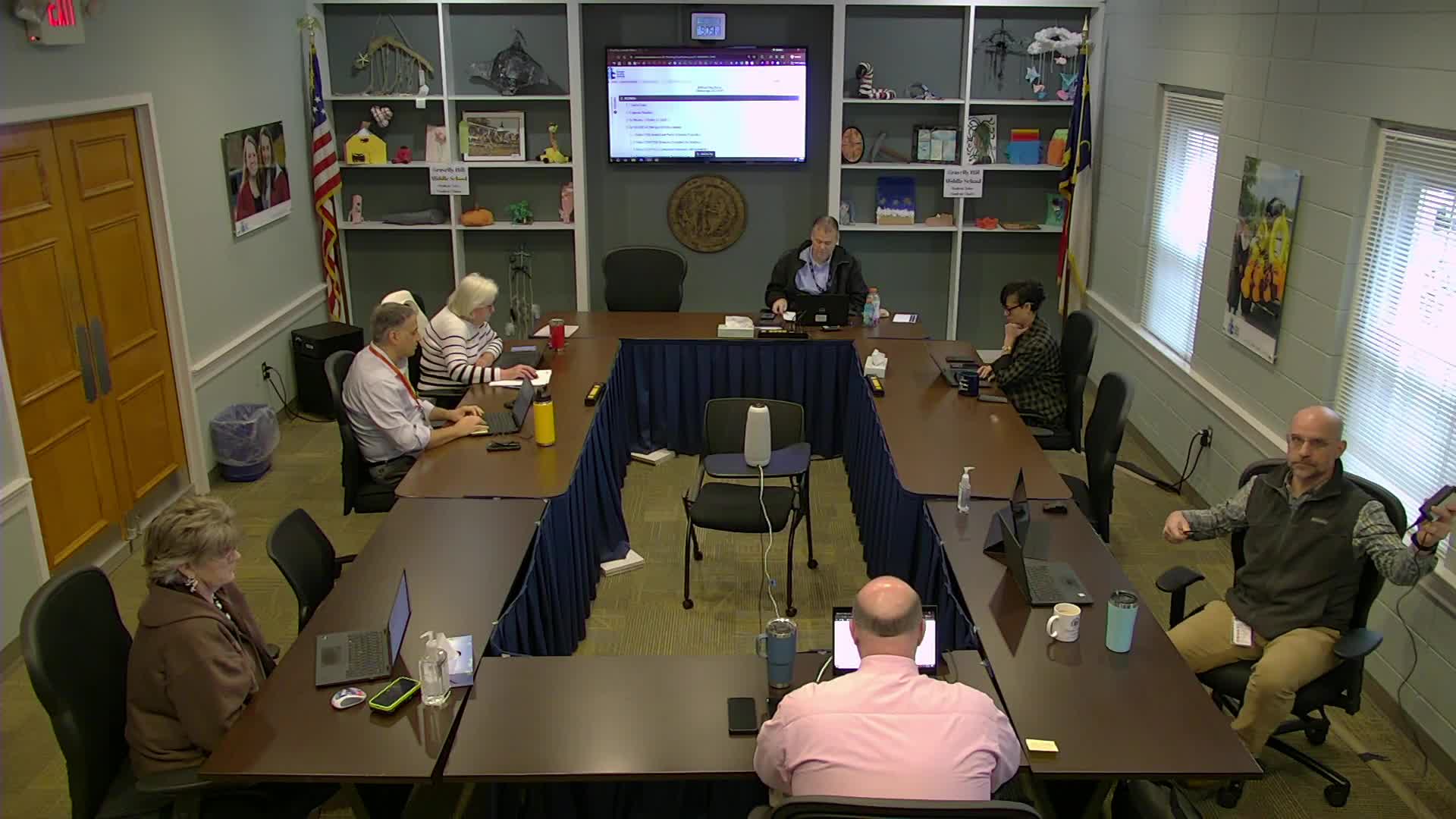 Policy committee advances more than 50 school policies to first reading, flags social-media, fees and volunteer rules for clarification