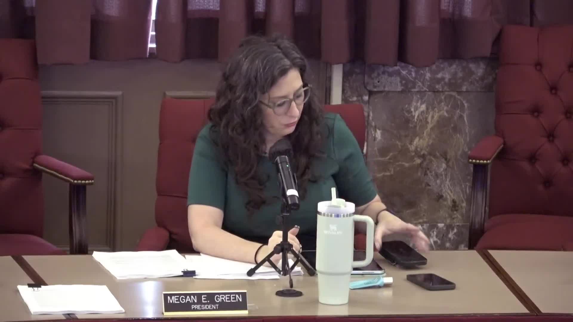 After initial setback, committee approves $25,000 transfer to legal contingency fund and discusses temporary hire to cover staff burnout