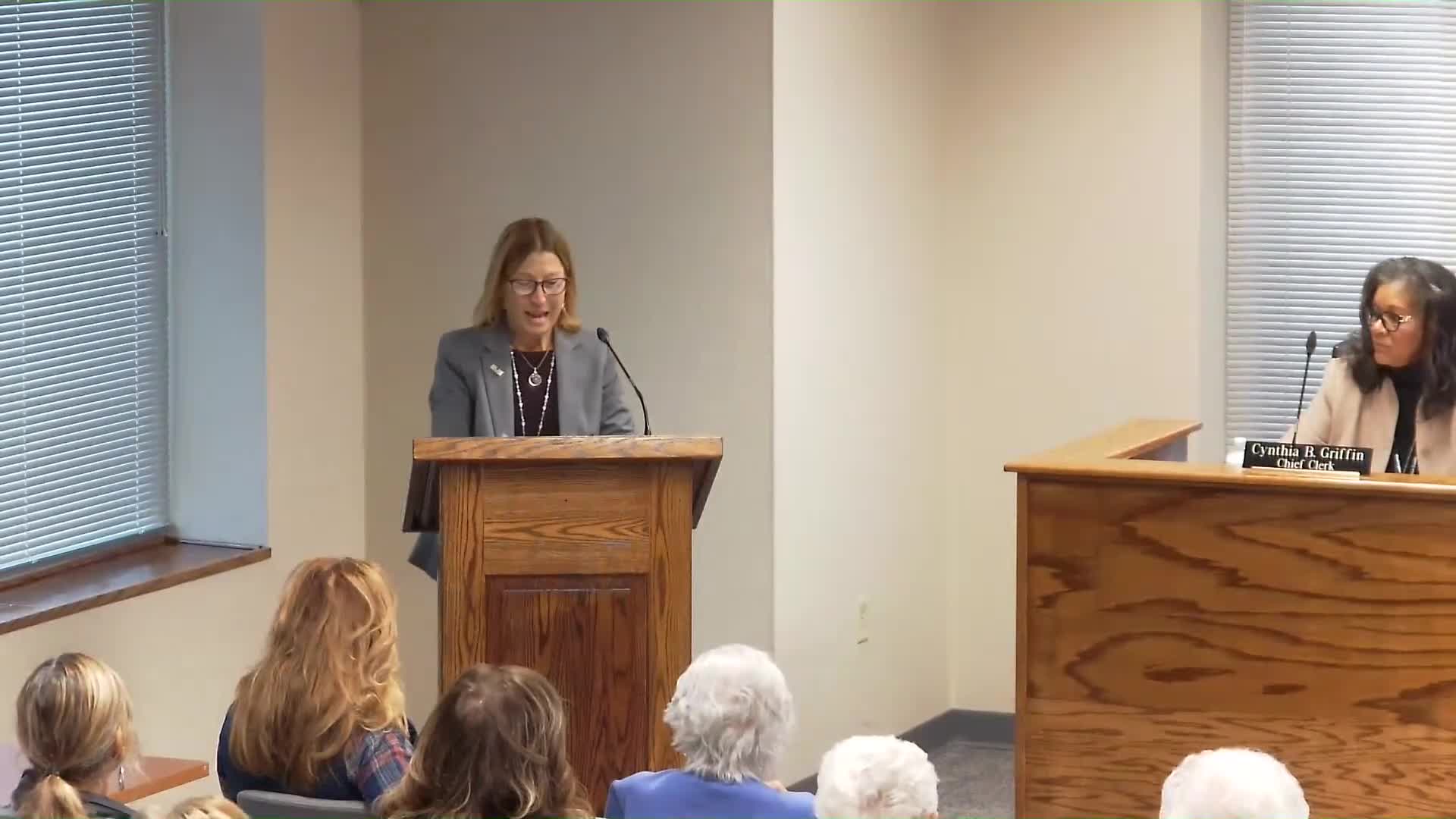 Residents and recovery workers urge commissioners to keep independent drug-and-alcohol authority; county votes to send letter of intent for state review