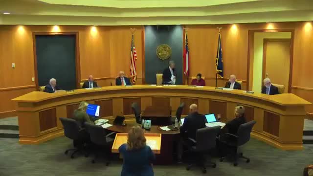 Turnstone Group seeks MXD rezoning and offers link‑trail land swap; council probes costs and guarantees