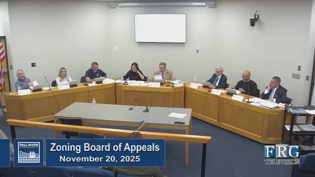 ZBA approves variance for new single‑family dwelling and ADU at 104 Lawton St., with conditions