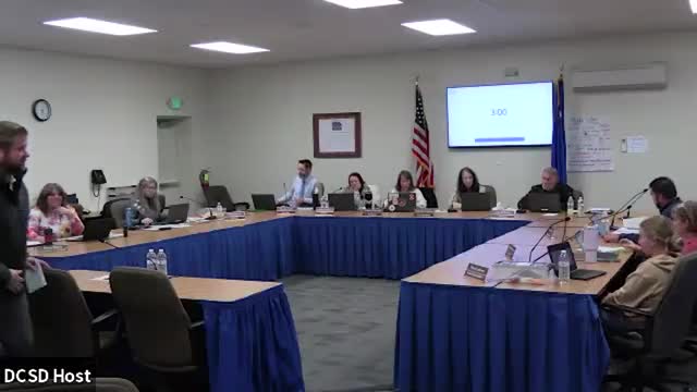 Douglas County School District board selects higher‑deductible stop‑loss option after debate over risk and savings