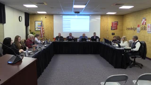 Board honors outgoing directors and hears student report on Veterans Day events
