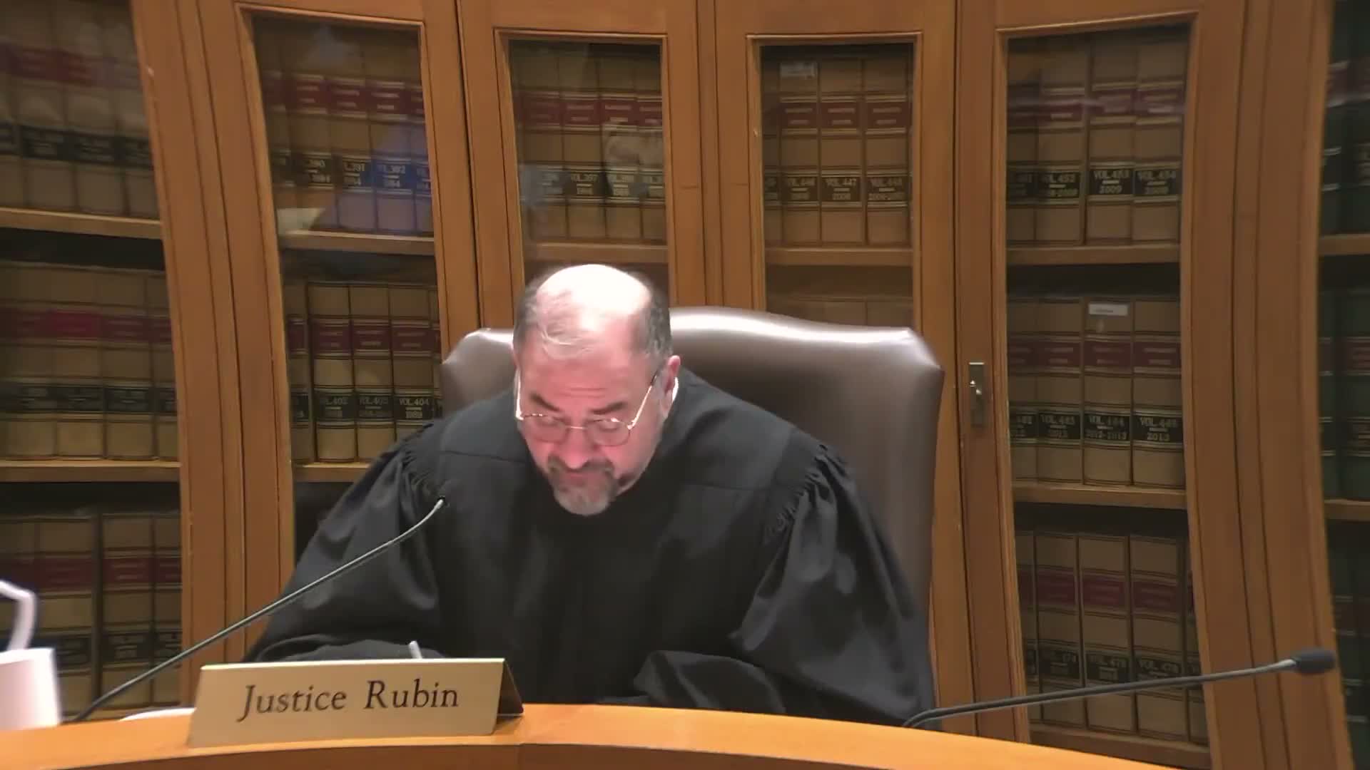 Appeals court weighs due-process claim over exclusion of social-worker release plan