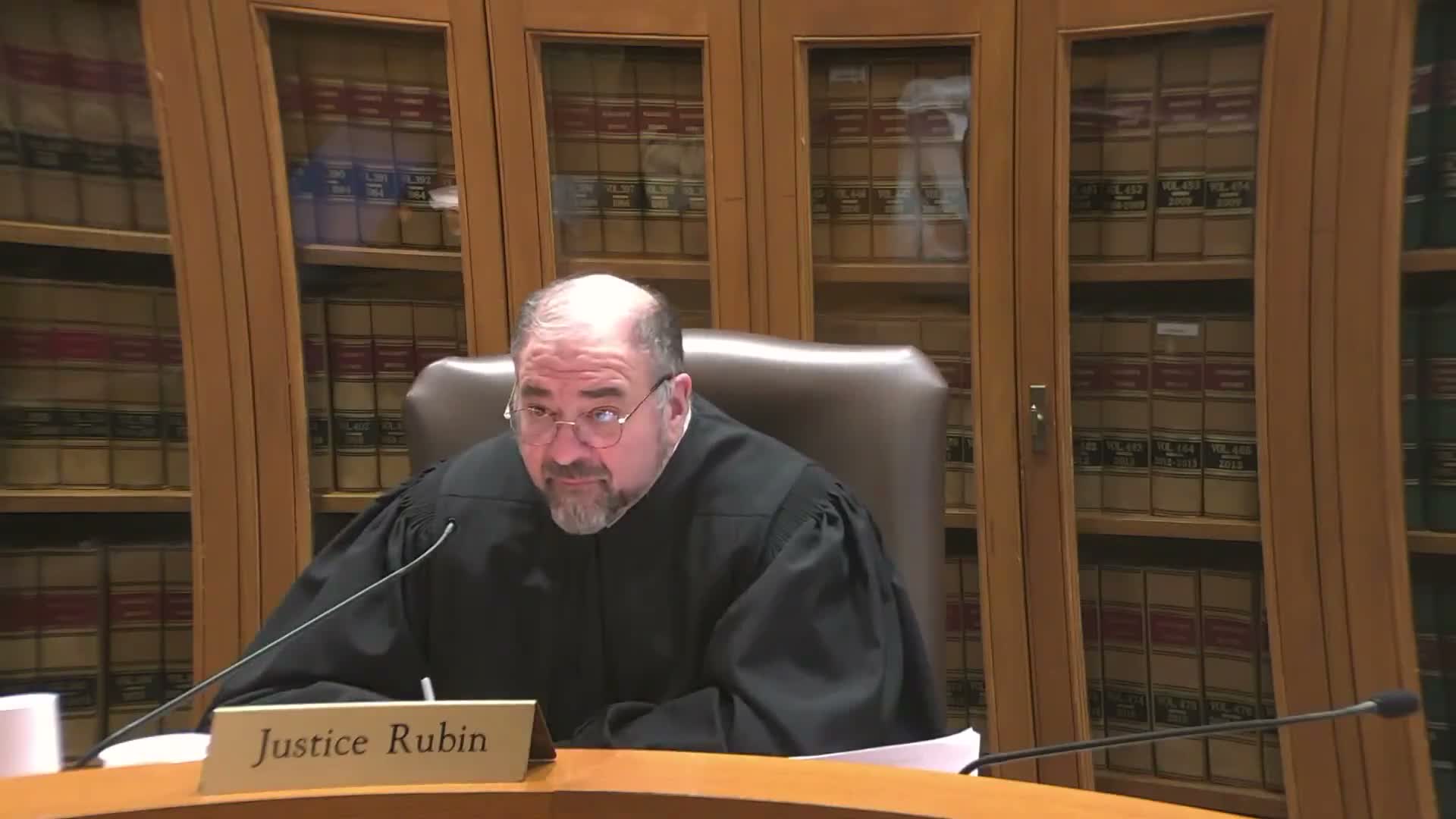 Appeals court reviews registry-classification and denial of expert funds