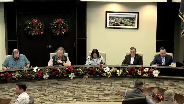 Council authorizes temporary construction easement offer to Andover Crossing; recesses into executive session on real-estate acquisitions