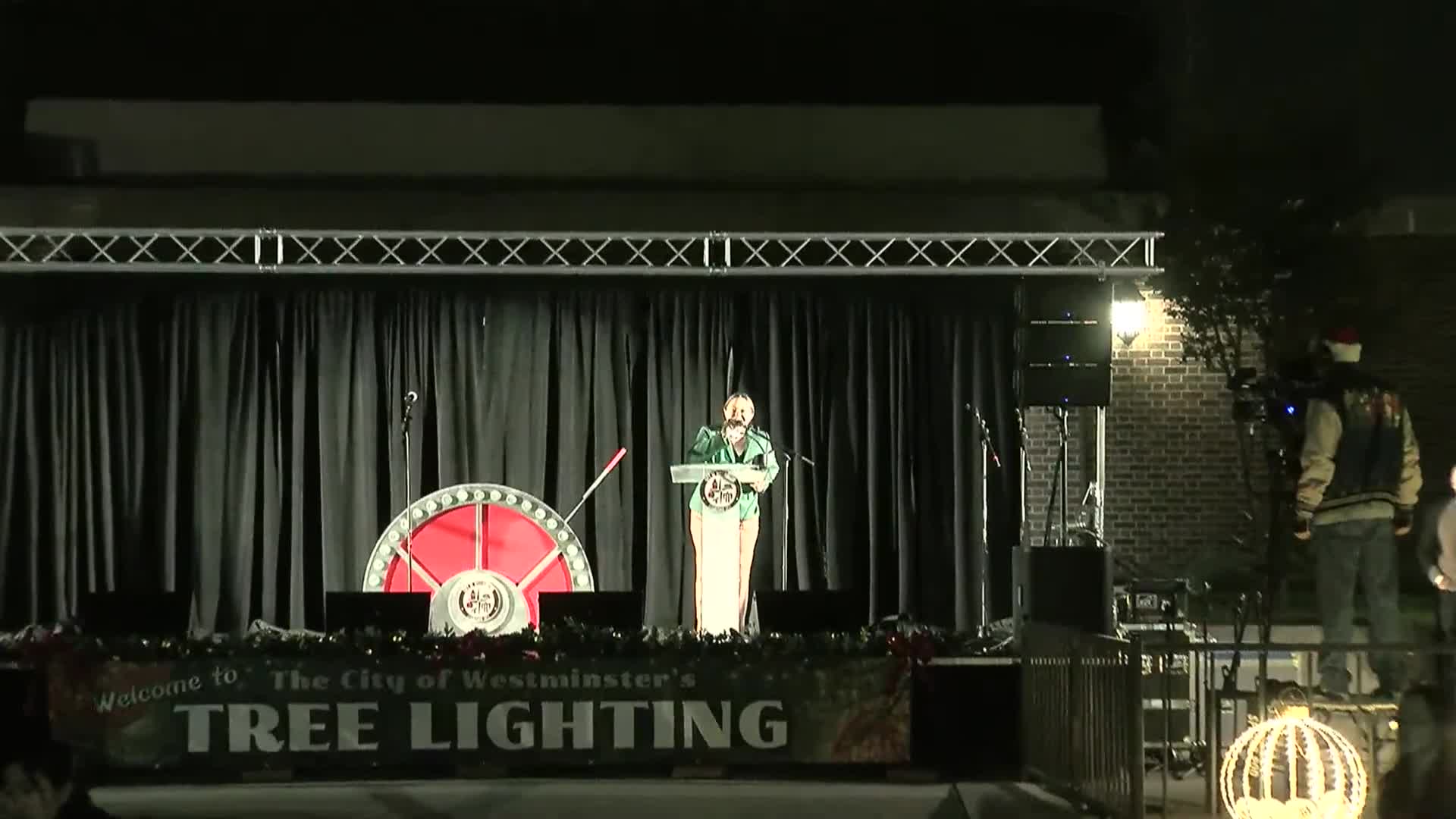 Westminster lights 34-foot tree as Santa greets families at Sunken Gardens