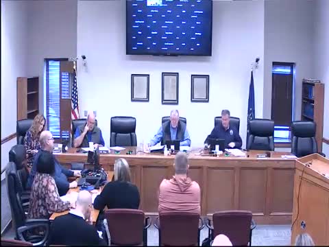 Commissioners take highway and bridge bids under advisement; low and high bidder totals reported