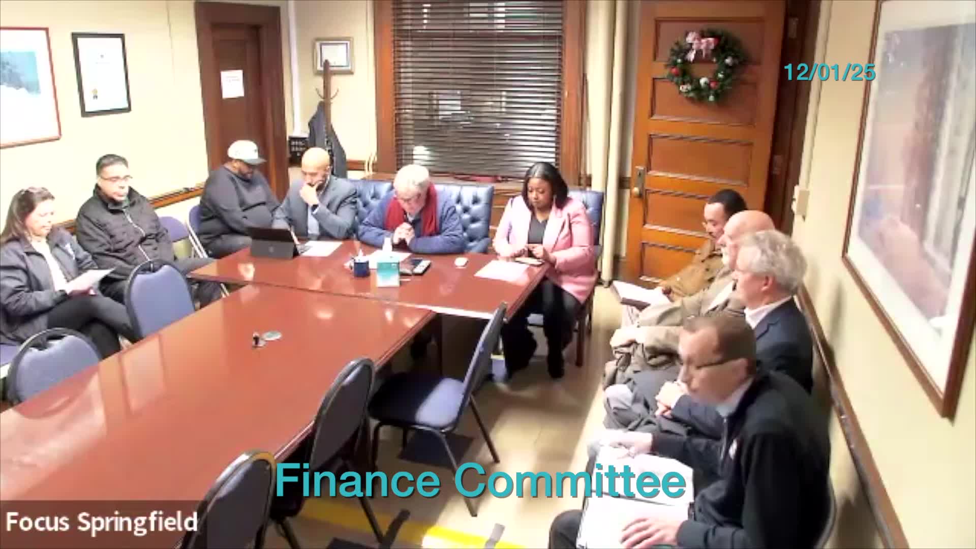 Finance committee advances October budget update and free‑cash allocations to full council