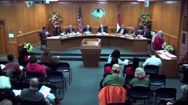 Clinton council approves pay‑plan adjustments aimed at retaining utilities and public‑works staff