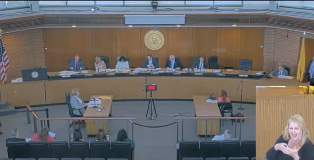 Board unanimously adopts administrative calendar amid heated public exchange over budget