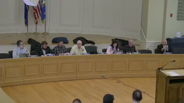 Planning commission approves lot‑line adjustment and zone‑boundary relocation at 5 Dixon Street