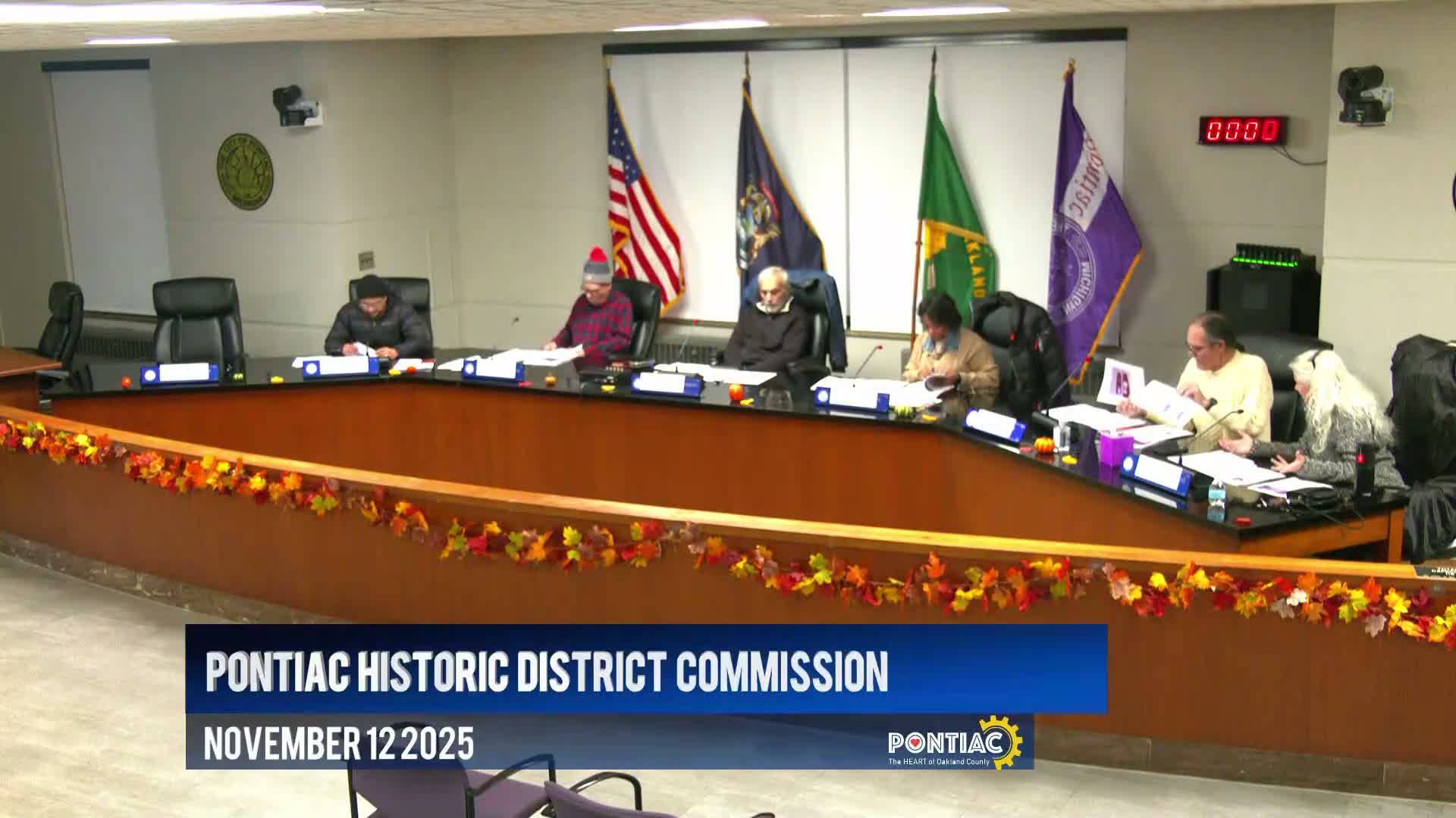 Heated debate in Pontiac HDC over re-siding at 75 Cherokee; porch and deck work approved, siding decision tabled