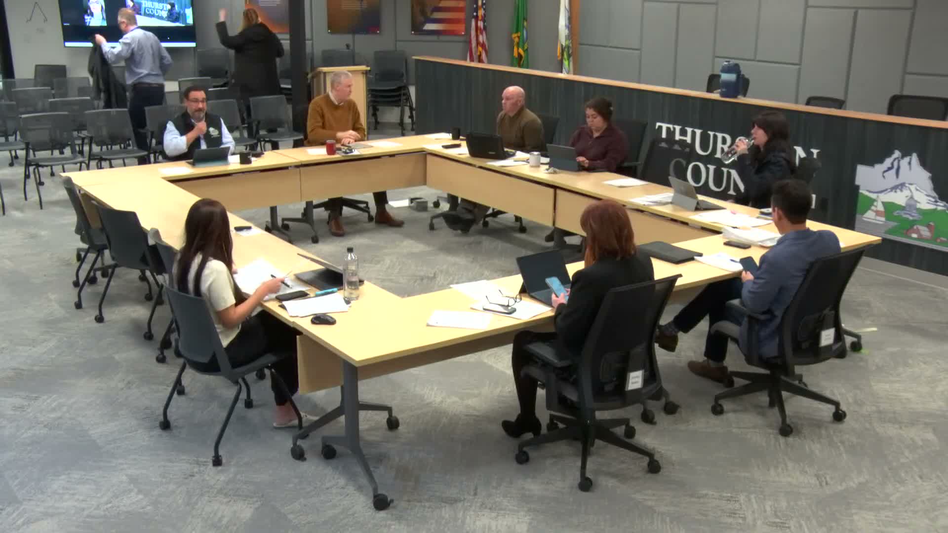 Commissioners debate public‑comment pilot after mixed public feedback; no change adopted