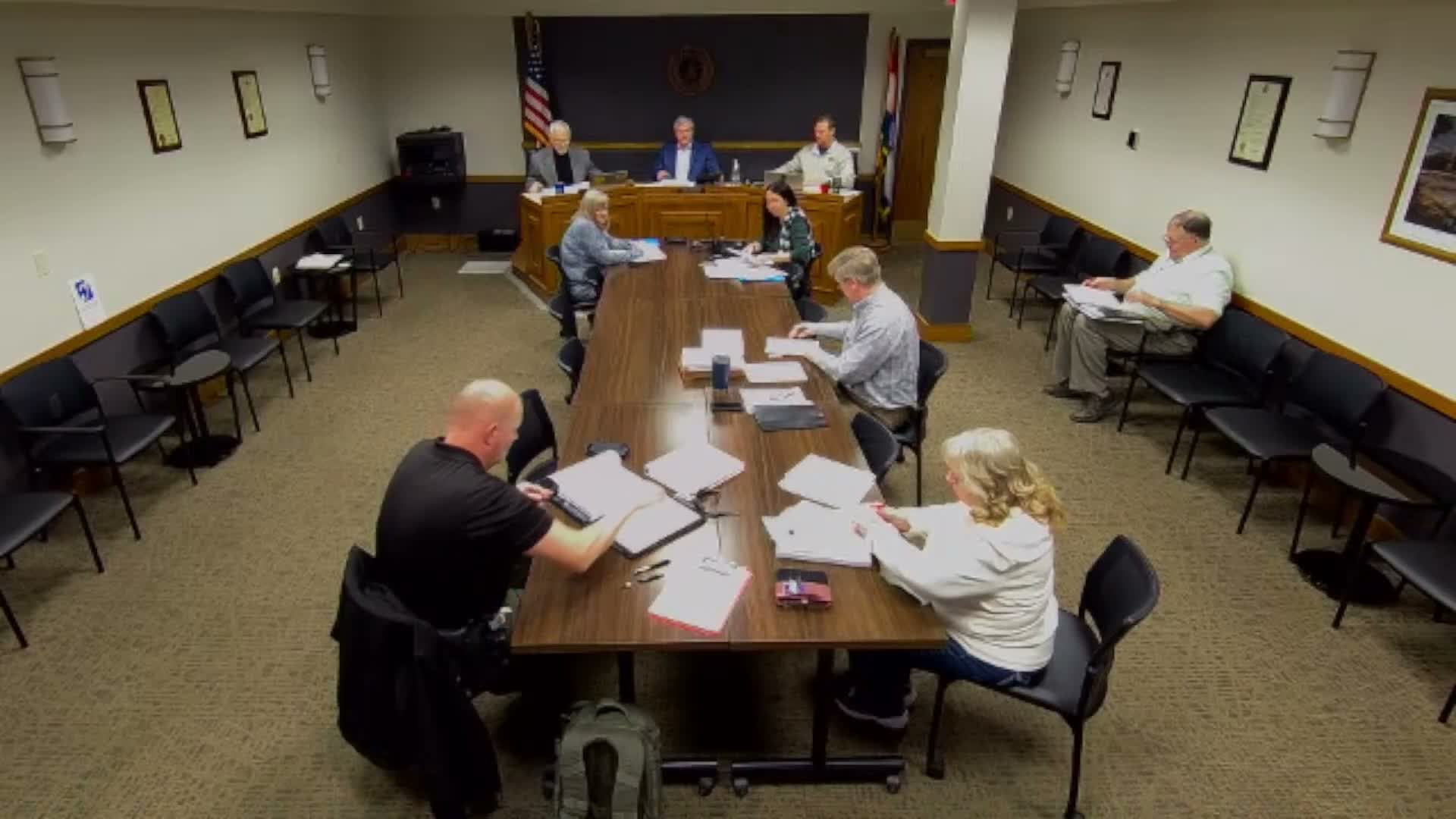 Cole County commissioners advance salary adjustments, set pay‑grid timing amid budget discussion